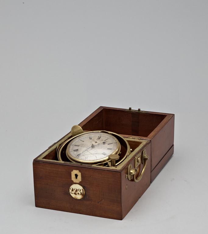 A Victorian middle 19th Century mahogny and brass-mounted Parkinson & Frodsham two days Marine Chronometer.