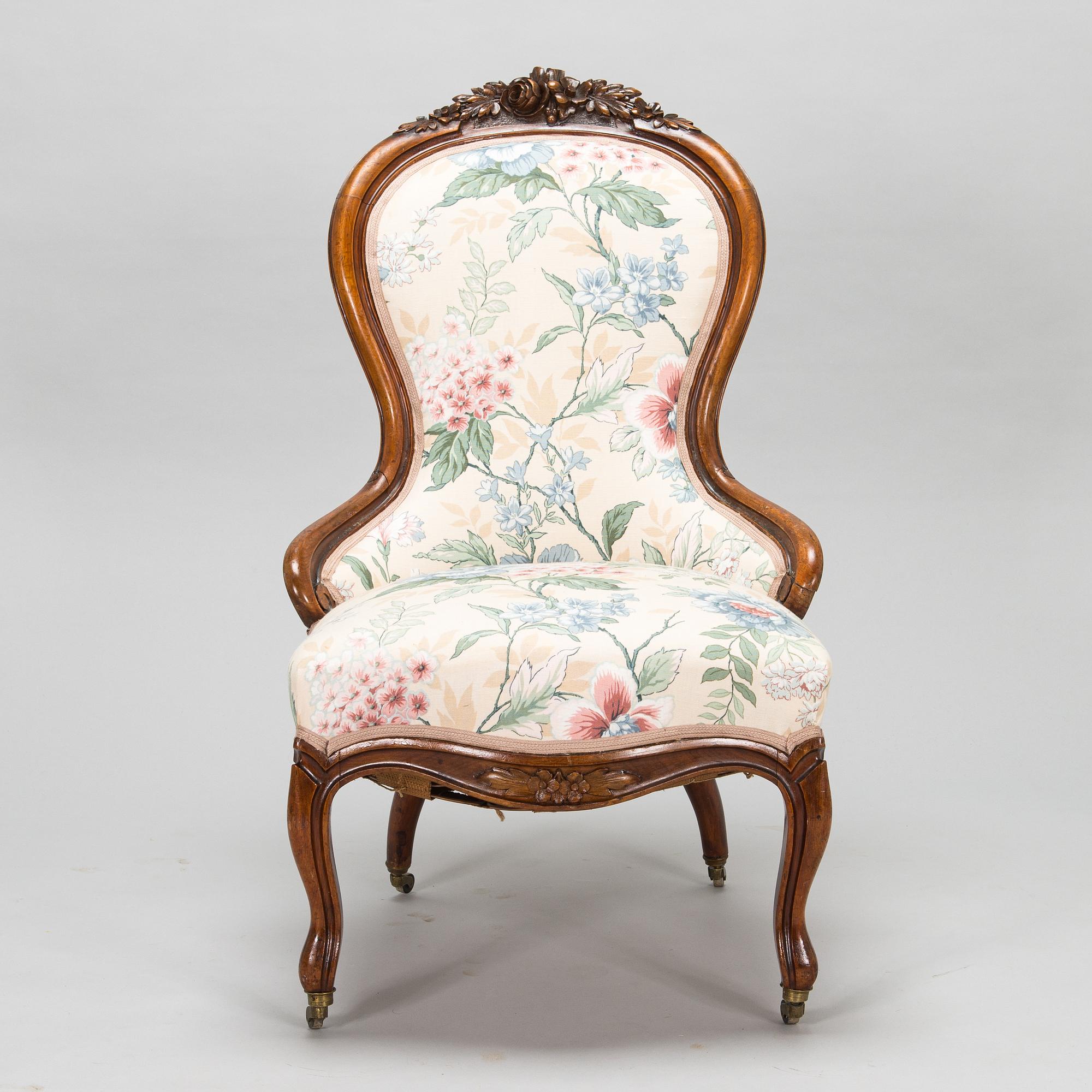 A late 19th century armchair in Rococo style.