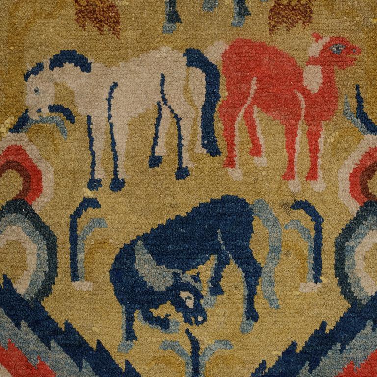 A semi-antique chinese Baotou rug, ca 147,5 x 72 cm.