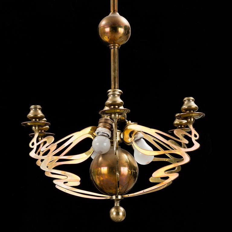 A brass Art Nouveau ceiling light, early 20th century.