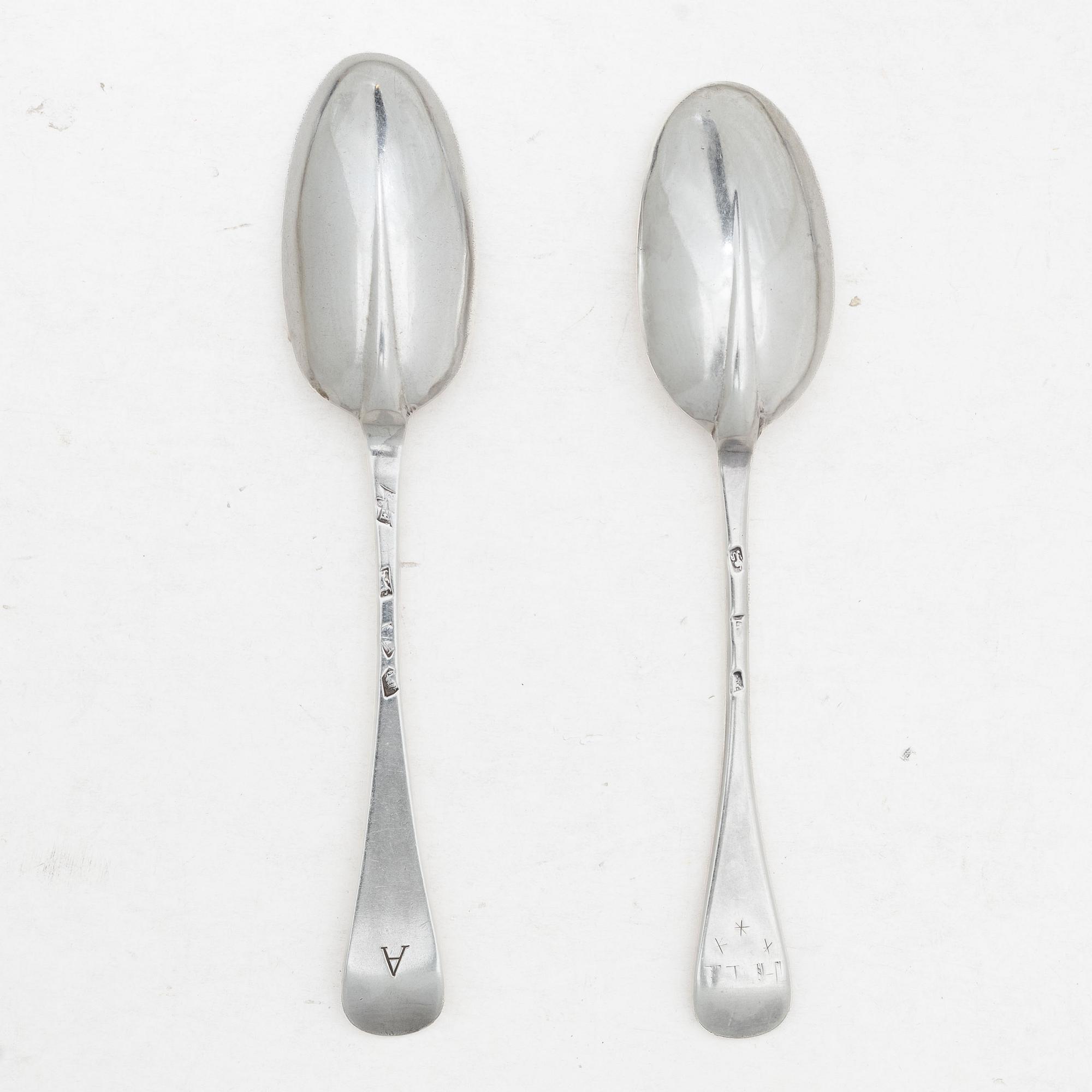 Two silver rat-tail spoons, one with mark of Edward Bennett I, London, circa 1730.