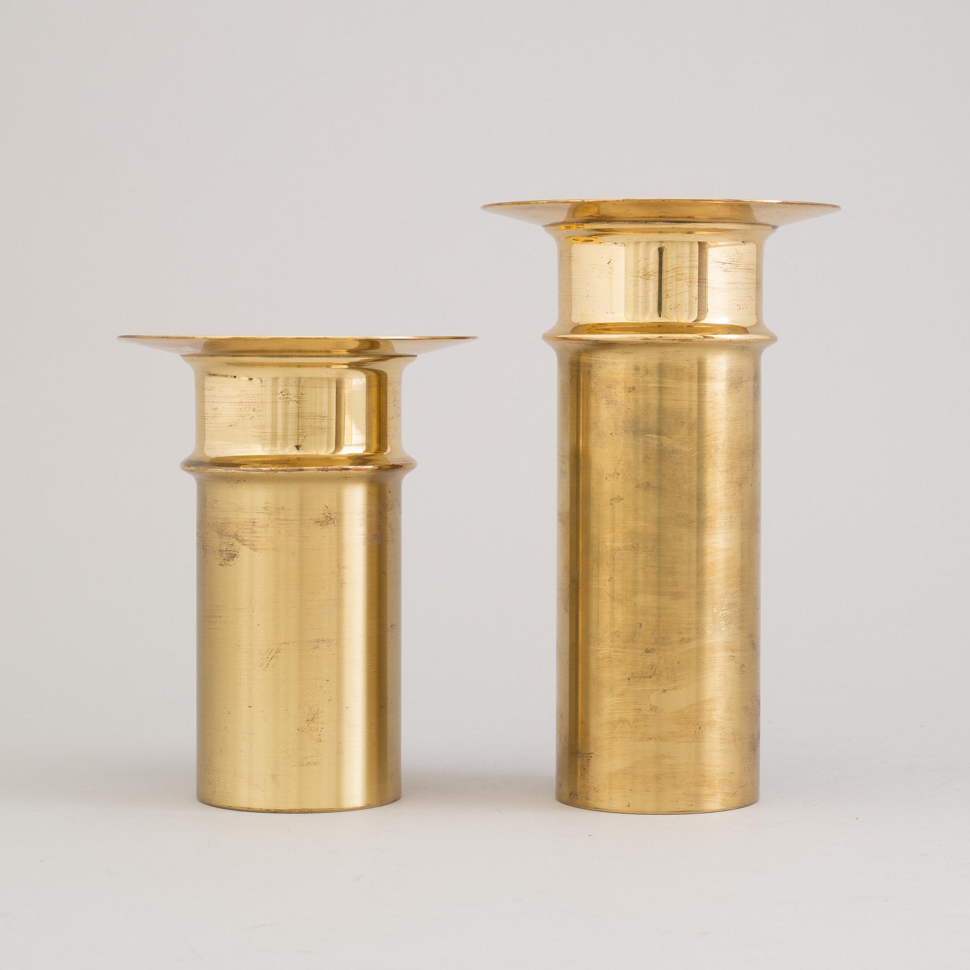 TAPIO WIRKKALA, a pair of brass candlesticks from Kultakeskus Oy, Finland.