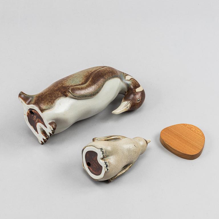 Gunnar Nylund, two stoneware figurines of penguines for Rörstrand.