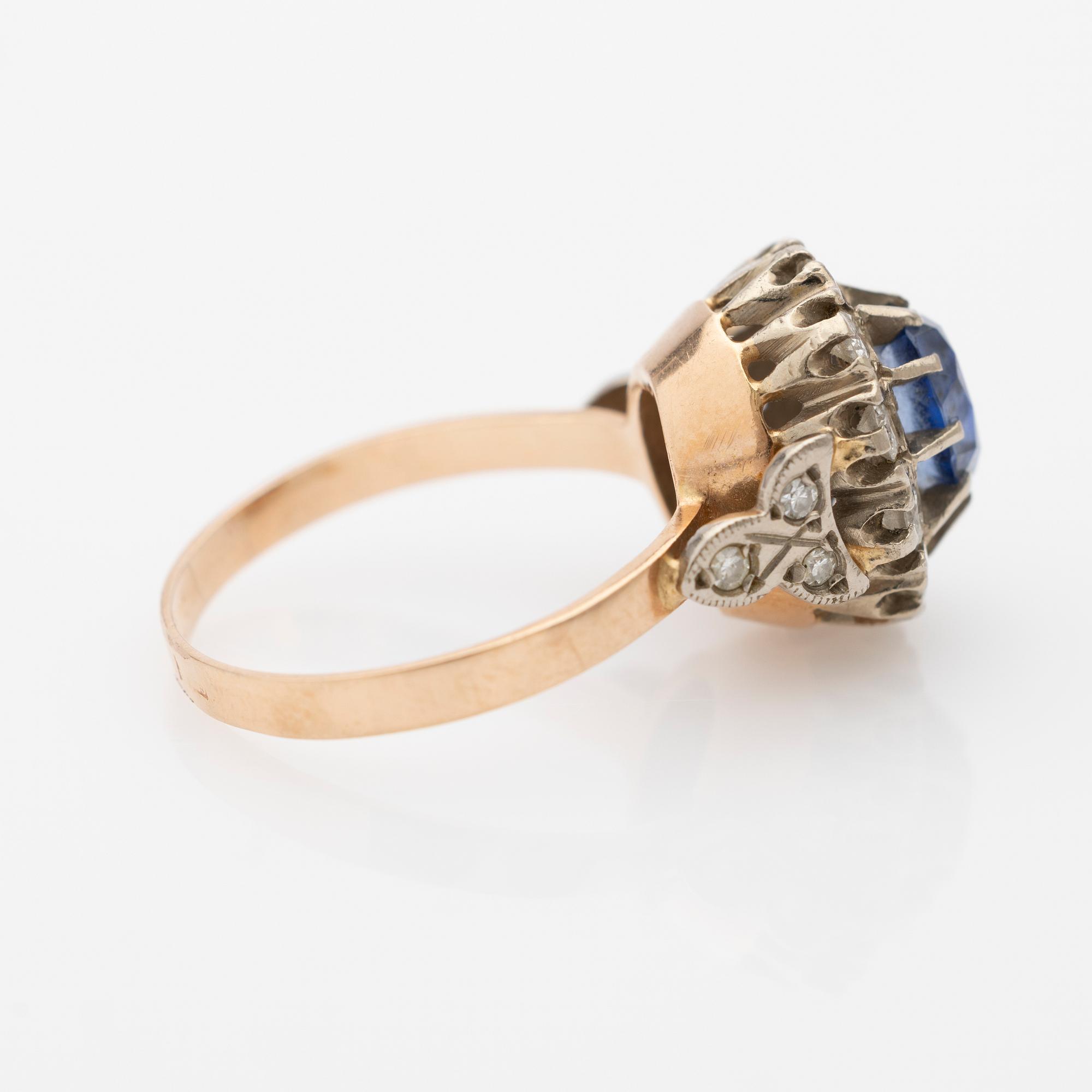 Ring, 18k gold with diamonds and sapphire.