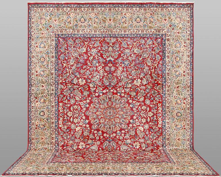 A carpet Yazd, c. 394 x 299 cm.