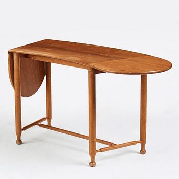 Josef Frank, a mahogany extendable side table, model 1133, Svenskt Tenn, Sweden, mid 20th century, provenance Estrid Ericson.