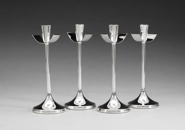A set of four Vera Ferngren silver candlesticks by GAB, Stockholm 1967.