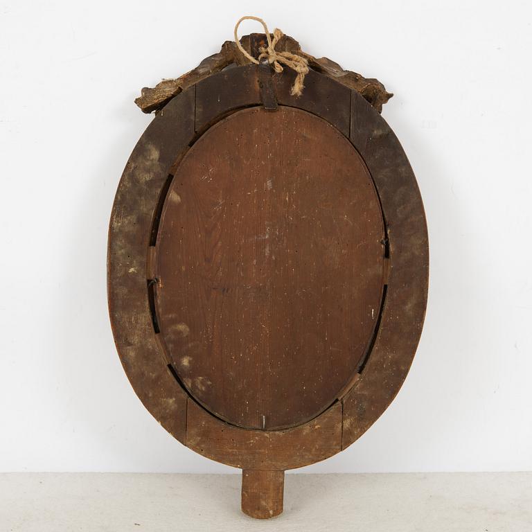 A Gustavian giltwood two-branch girandole mirror, late 18th century.