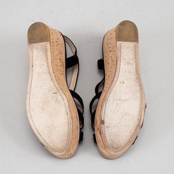 Prada, a pair of black suede wedge sandals, size 39½.