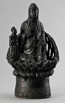 A black figure of Guanyin, Qing dynasty.