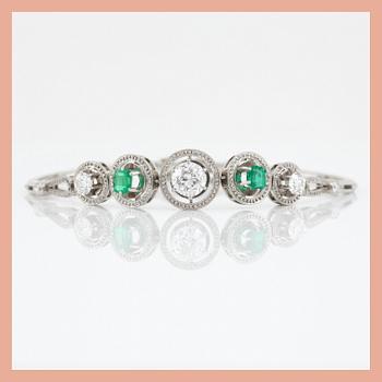 An emerald and old-cut diamond bracelet. Total carat weight of diamonds circa 1.50 cts.