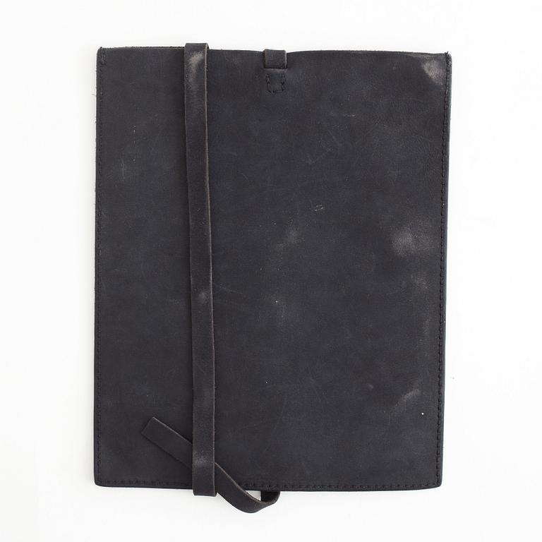 A pair of Uma Wang + Rigards, 'The Victorian', sunglasses and a Uma Wang, ipad case.