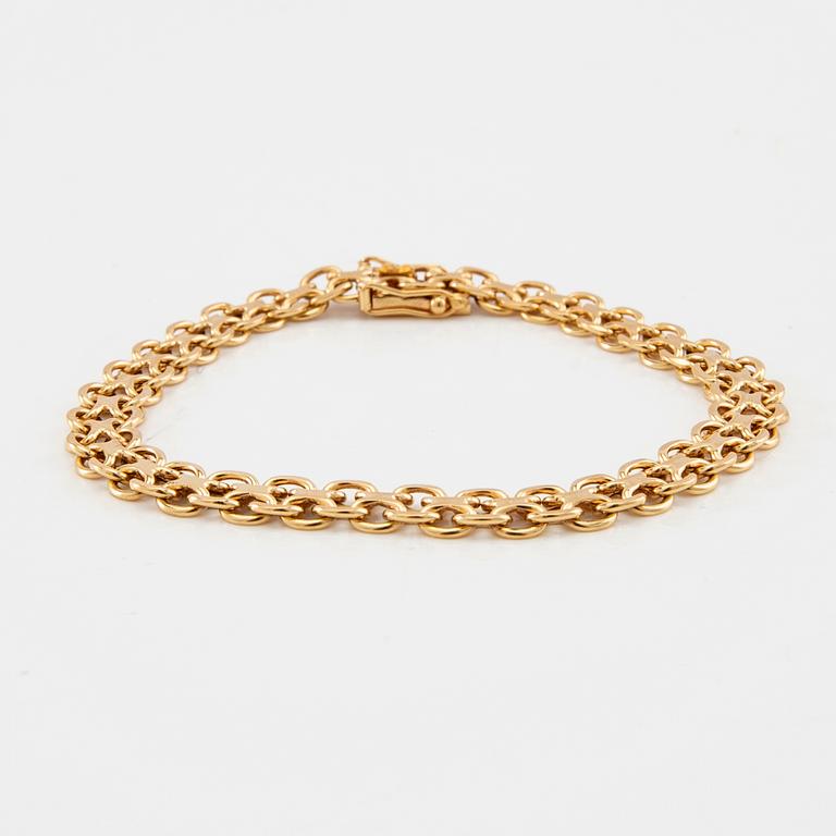 Bracelet X-link 18K gold.