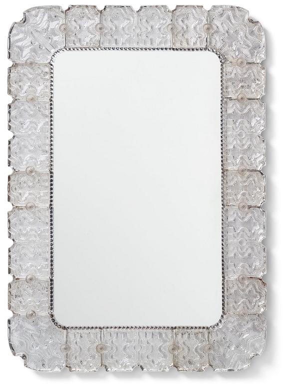 Carl Fagerlund, a Swedish Modern cast glass framed mirror, Orrefors ca 1940-50's.
