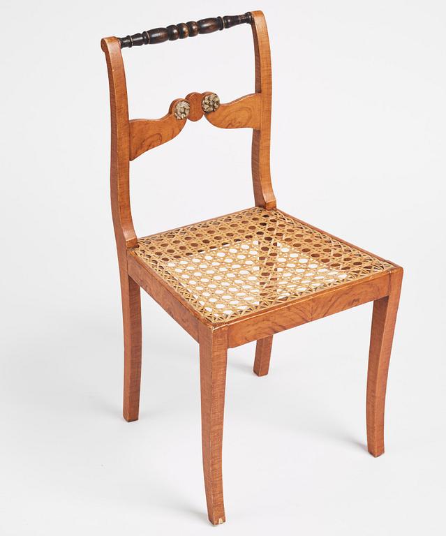 An Empire chair, first half of the 19th century.