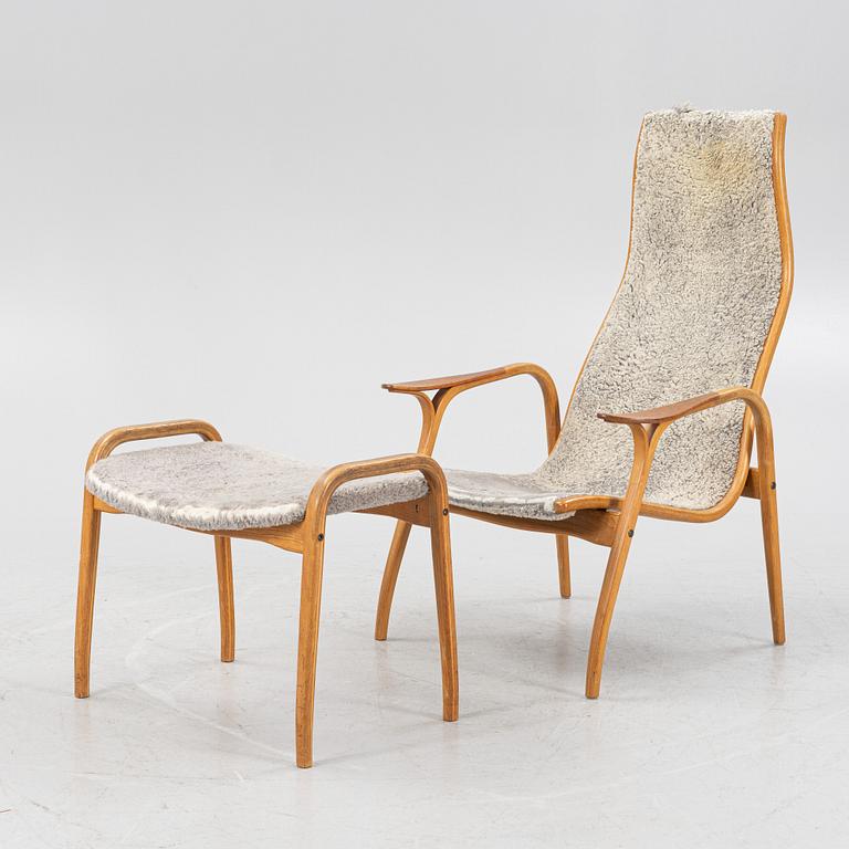 Yngve Ekström, an oak 'Lamino' easy chair with foot stool  for Swedese,