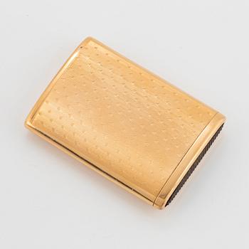 An 18K gold match box.