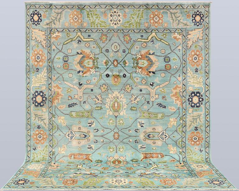 A rug, Ziegler design, approx. 290 x 235 cm.