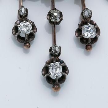 An antique-cut diamond pendant/brooch.