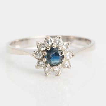 A sapphire and ca 0.25 ct brilliant diamond ring.