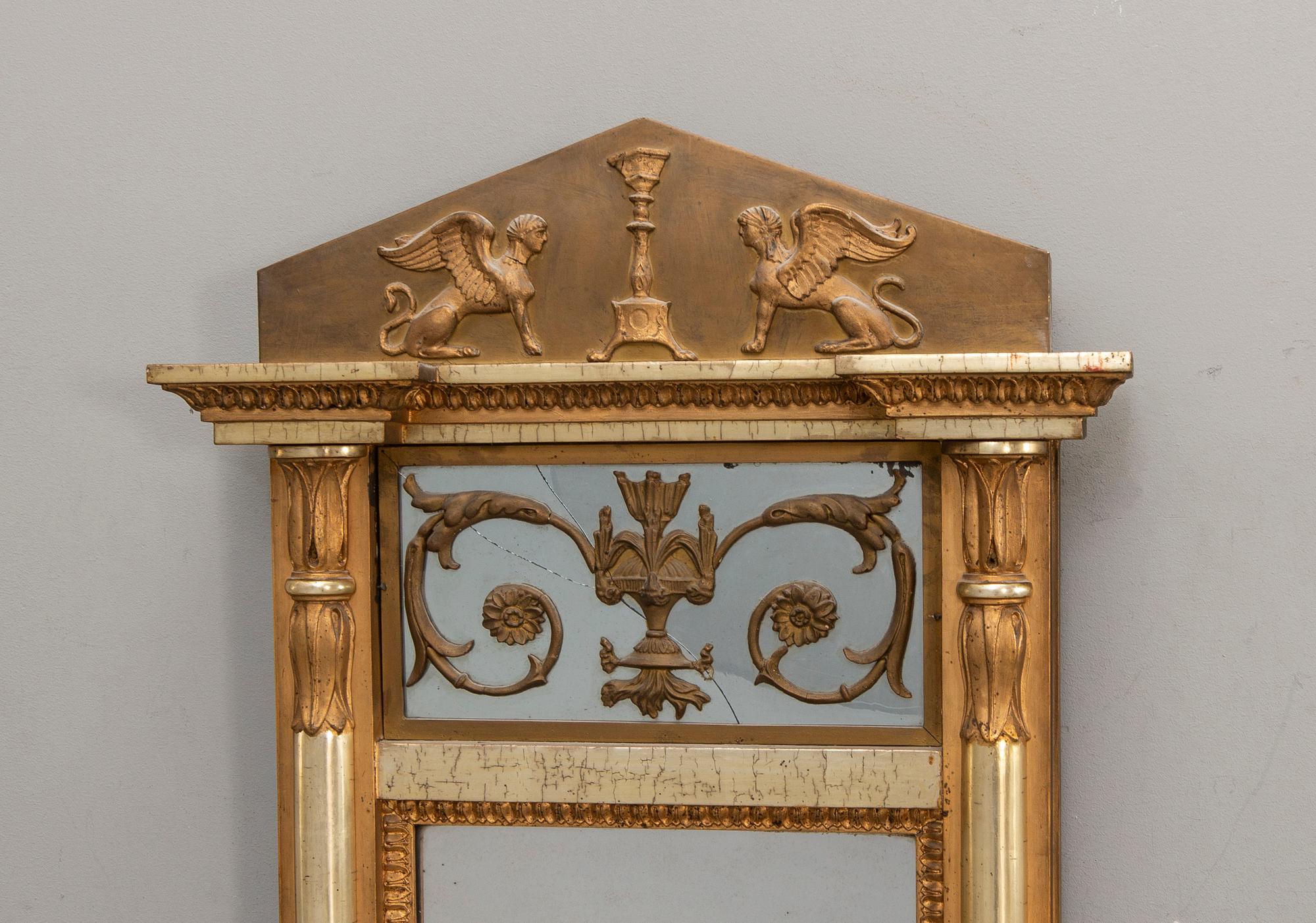 A Swedish bronzed Empire mirror by JM Berg Gothenburg.