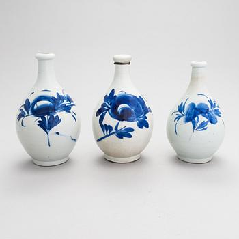 Seven ceramic sake bottles, Japan, the first half of the 20th century.