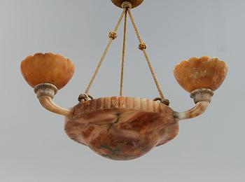 TAKAMPEL, alabaster, 1900-talets första hälft. Höjd ca 65 cm.