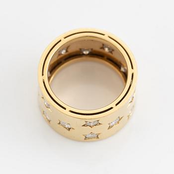 Brilliant cut diamond star shaped ring.