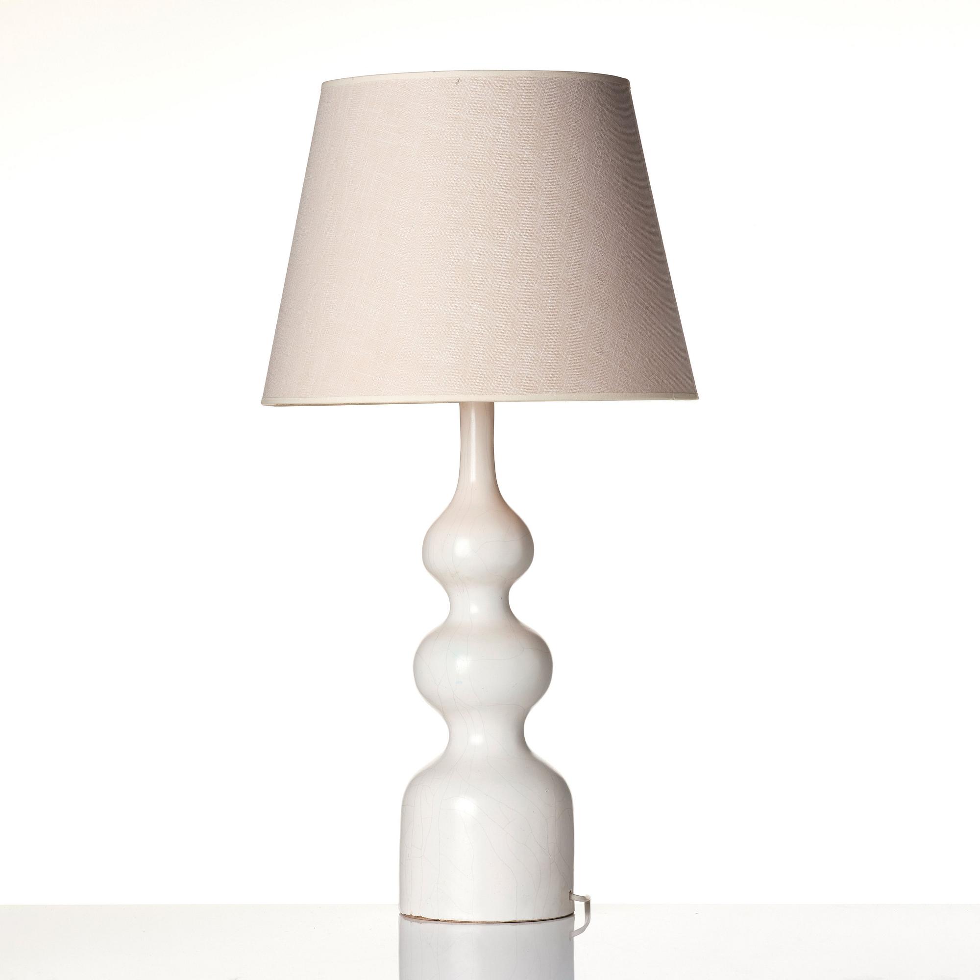 Georges Jouve, a white glazed "Trois Boules" ceramic table lamp with craquelure, France, 1950s.