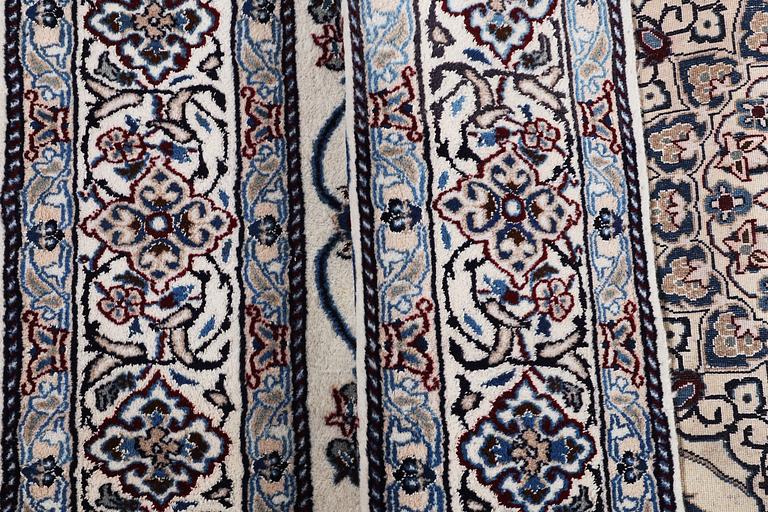 A carpet, Nain, part silk, 9 laa, ca 290 x 196 cm.