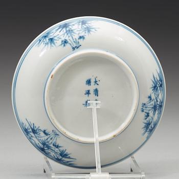 A blue and white dish, Qing dynasty, with Guangxus six character mark and of the period (1875-1908).