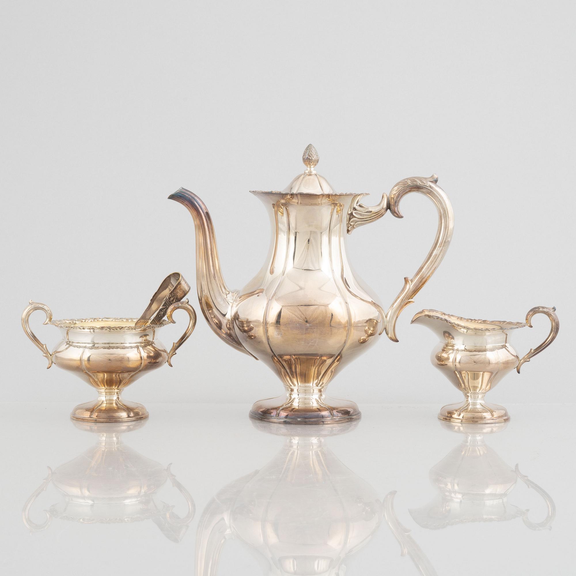 A three-piece Rococo style silver coffee set, Kultakeskus Oy, Tavastehus, Finland, 1973.