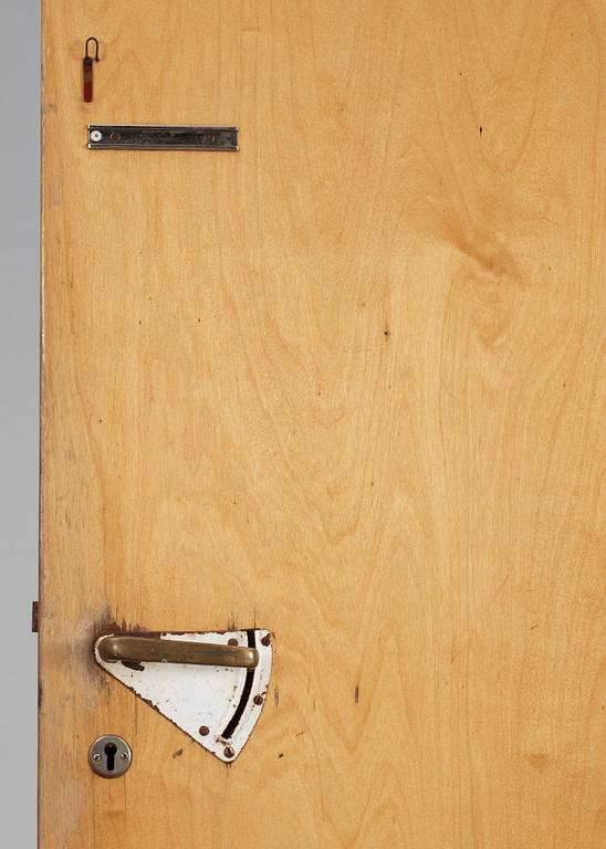 An Alvar Aalto borch plywood door, specifically for a patient's room of the Paimio Sanatorium, Finland ca 1932.