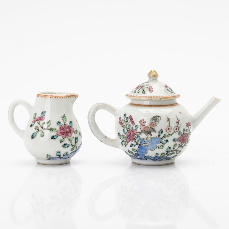 A Chinese famille rose porcelain teapot with cover and milk jug, Qing dynasty, Qianlong (1736–95).