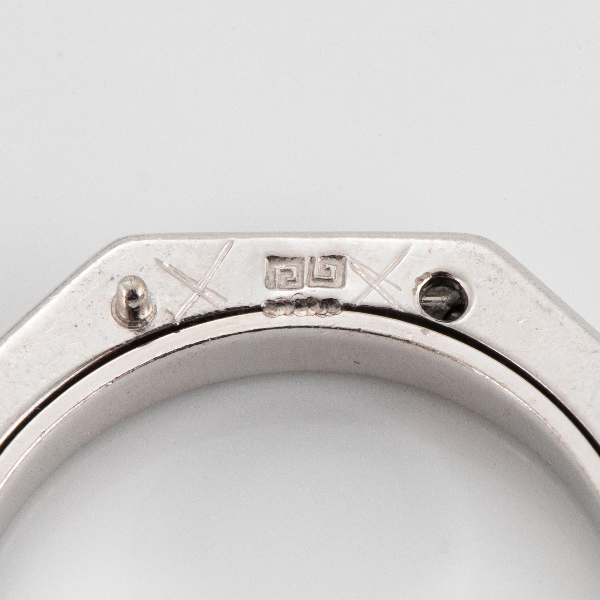 Five Paul Binder rings in 18K white gold set with baguette- and round brilliant-cut diamonds.