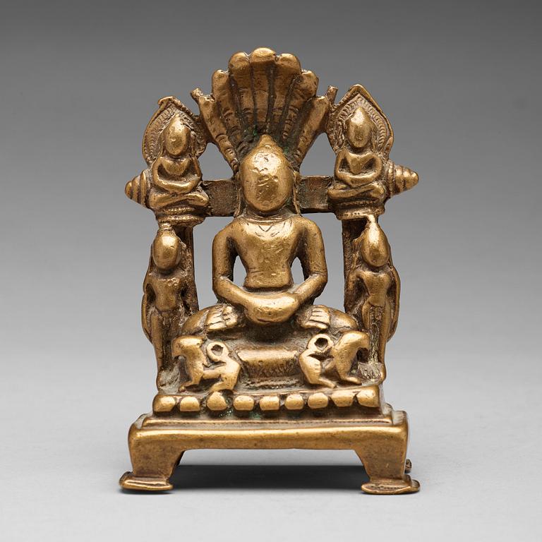 A copper alloy Jain shrine, western India, 19th Century or older. With inscription to the back.