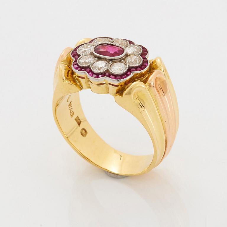 A WA Bolin ring in 18K gold set with rubies and round brilliant-cut diamonds.