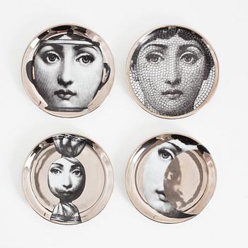 Fornasetti, four porcelain 'Tema e Variazioni' coasters, Italy.