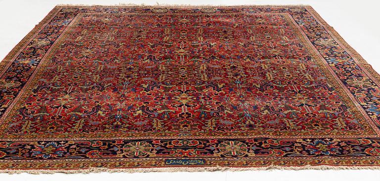 A semiantique carpet, noth western Persia, presumably Heriz, ca 381 x 308 cm.