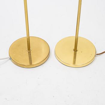 A pair of brass floor light from Möller Armatur, second part of the 20th Century.