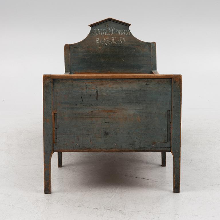 A 19th Century Painted Children's Bed.