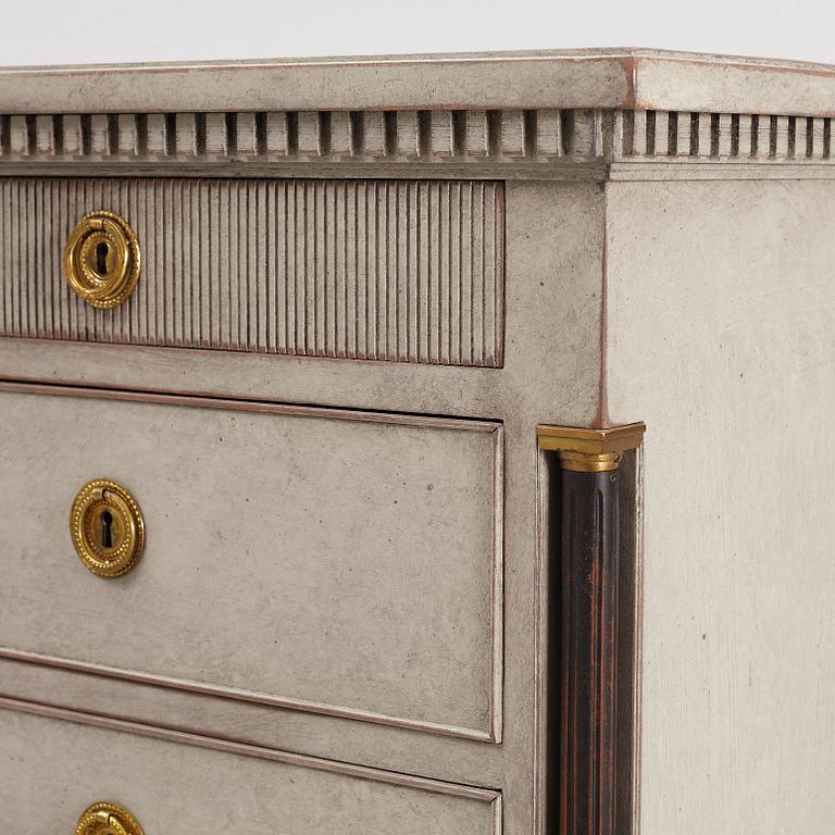 A chest of drawers, circa 1900.