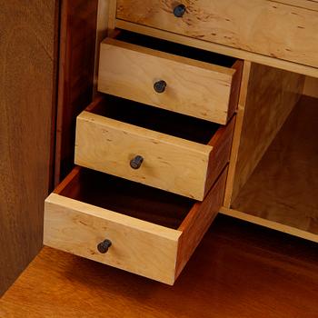 A 1940's Swedish Modern mahogany veneered cabinet.