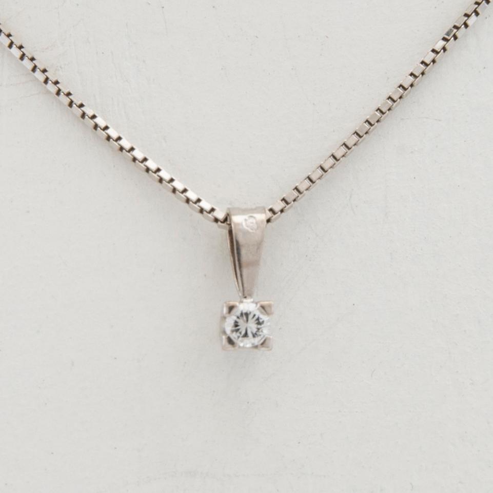 Necklace 18K white gold with a round brilliant-cut diamond.