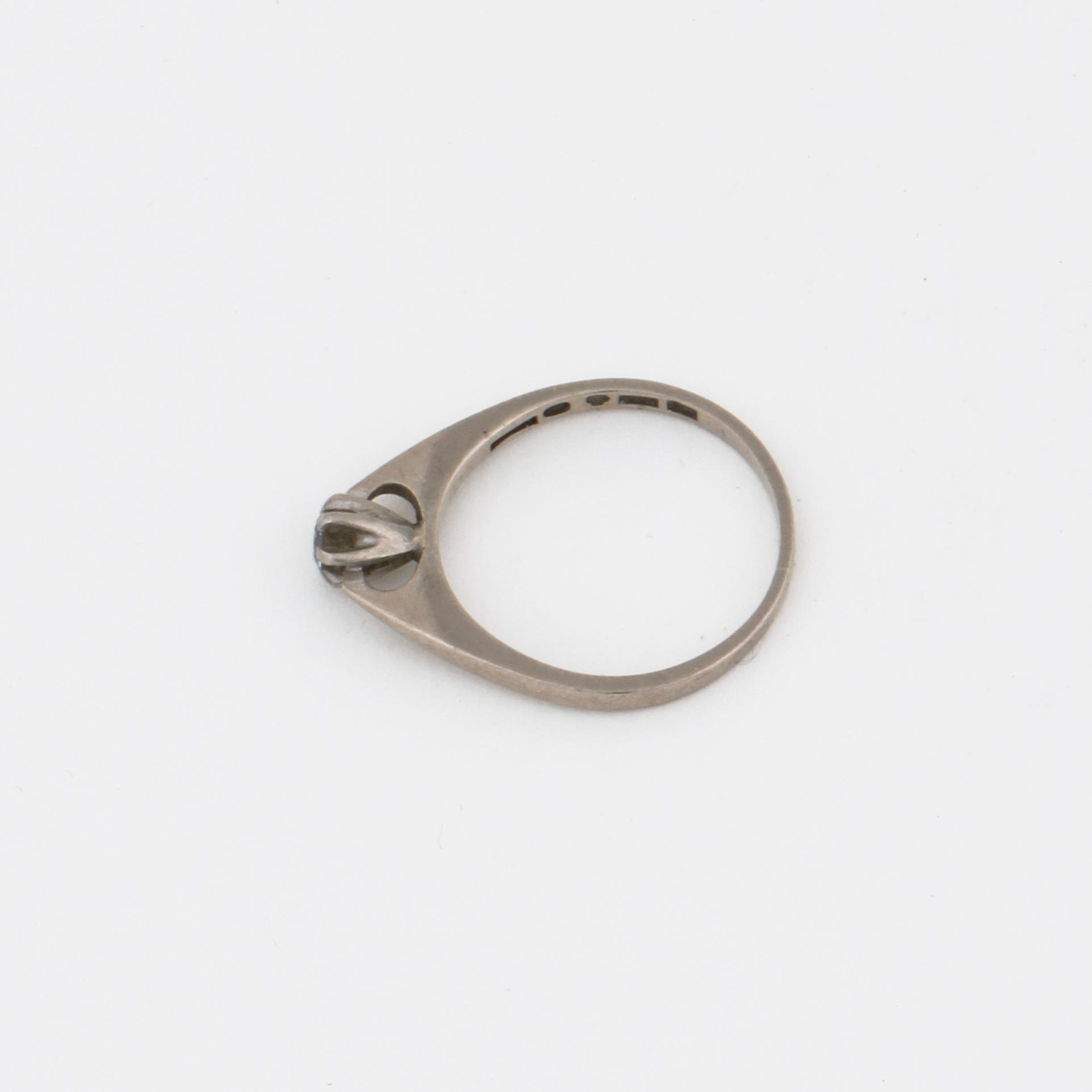 A brilliant cut diamond ring.