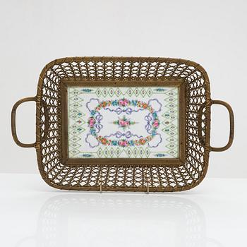A 19th-century porcelain and brass basket, marked with 'Sèvres' mark.