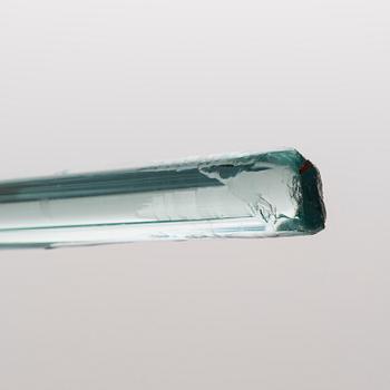 A greenish glass walking stick.