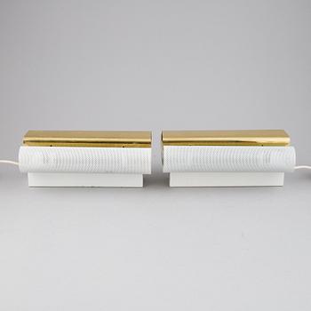 Hans-Agne Jakobsson, a pair of 'V-451/18L'/'Rasputin' brass wall lights from Markaryd.
