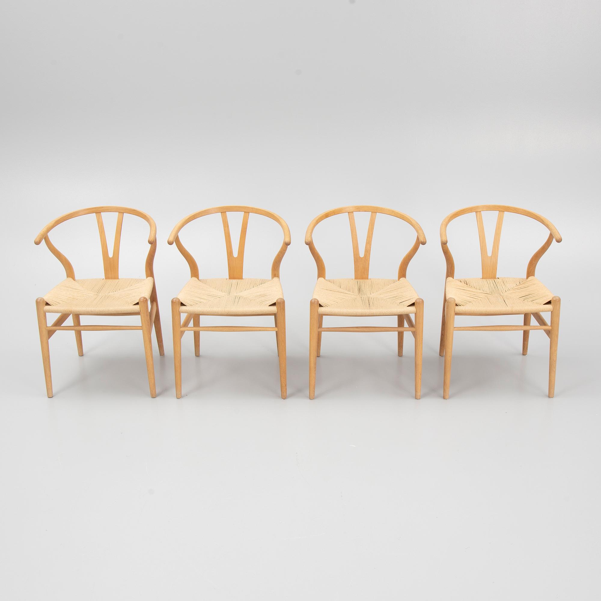 Hans J. Wegner, a set of four model 'CH-24' chairs, Carl Hansen & Søn, Denmark.