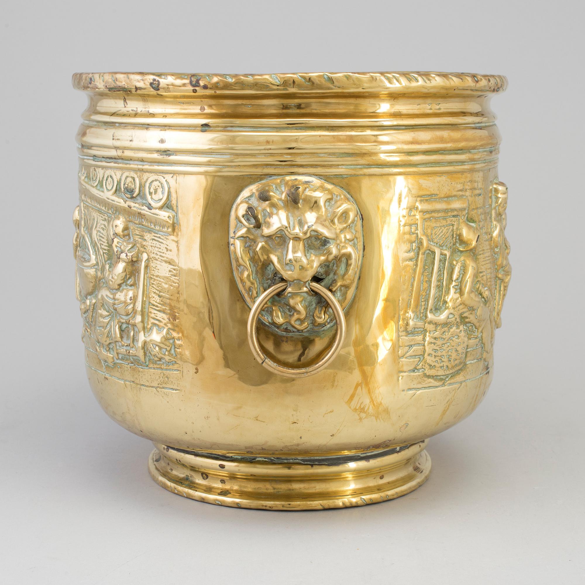 An 18th/19th century brass flower pot.